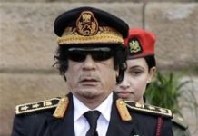 Breve viaggio in Italia : 2. Anno zero. Mouammar-Kadhafi-des-theories-sur-la-marche-du-monde-et-une-pratique-de-la-diplomatie-tres-particulieres___-_Photo-AFP_.jpg