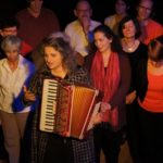 Sulle trace dell’immigrazione italiana: terra di scambio tra spettacolo e ricerca etnomusicologica. Anna Andreotti ǀ Sur les traces de l'Immigration italienne