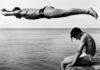 Un quadro per l’estate di Rosella Centani: Il tuffatore, una foto di Nino Migliori